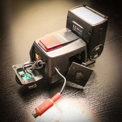 DIY Off-Camera Flash Hack: Wildlife Photographer With A 50mm