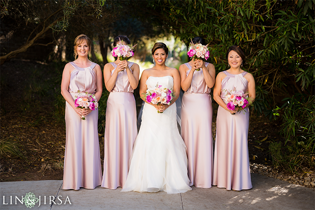 a bride in traditional indian attire poses with her bridesmaids.  AI-Generated 31858471 Stock Photo at Vecteezy