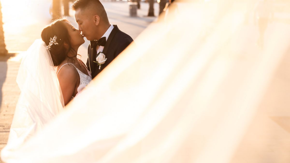 Premium Photo  Happy girl bride with bridal veil having fun