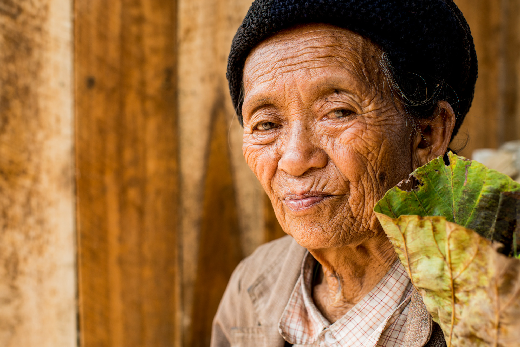Old Woman With Flowers
