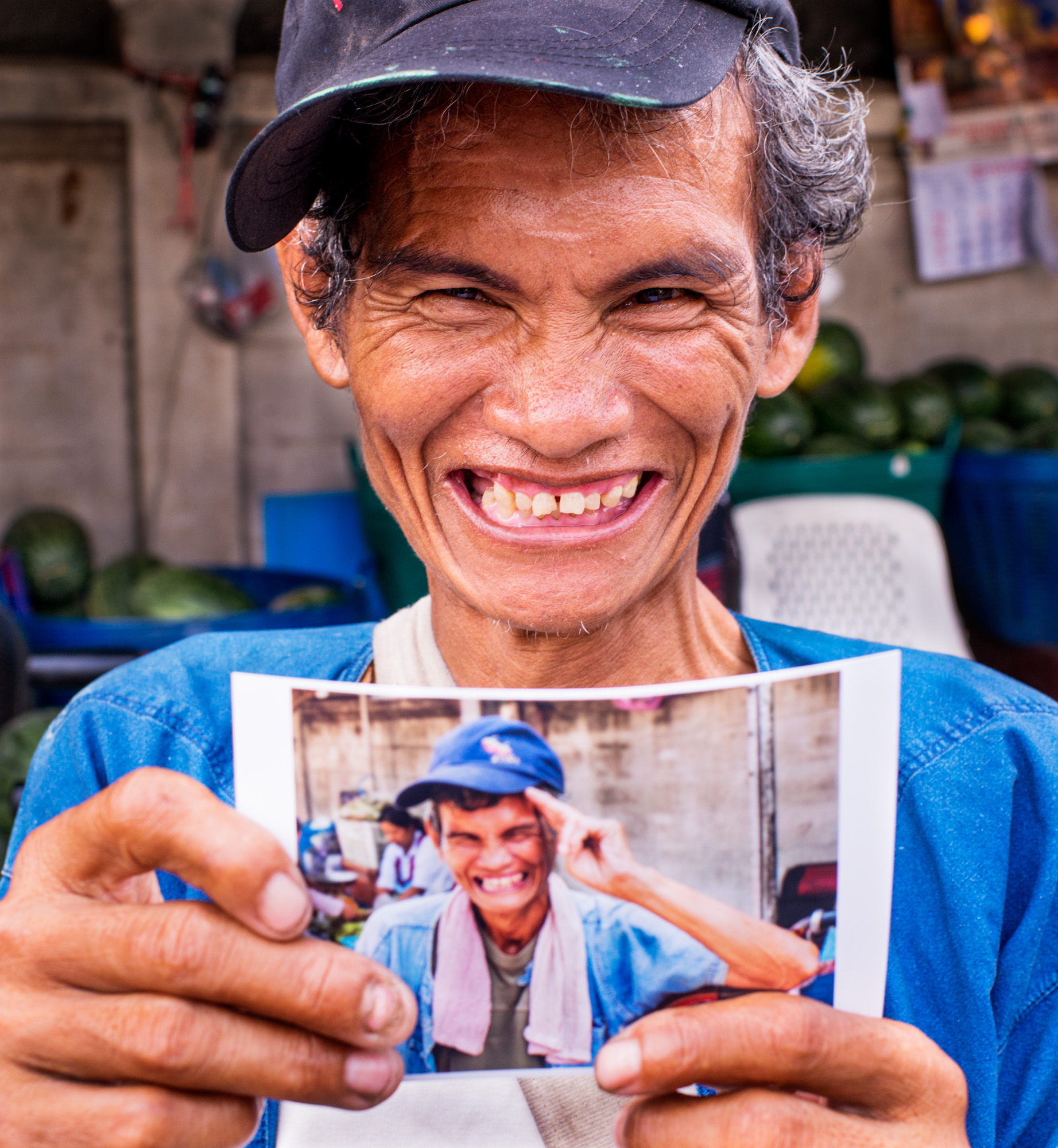 Person holding up a Portrait Print