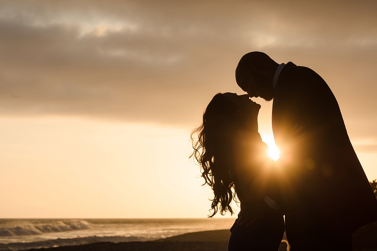 Golden hour silhouette of couple by Belinda Philleo