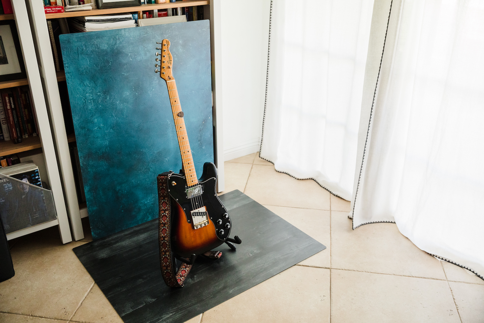 best product photography backdrops with guitar in front of window