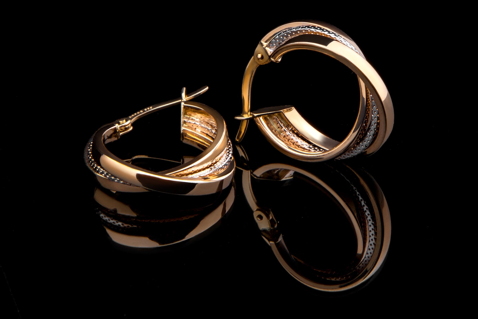jewelry photography bracelets on black backdrop