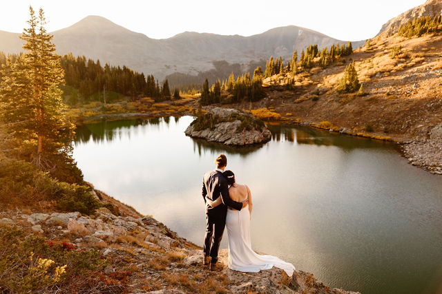 couple looks away for lake wedding photography