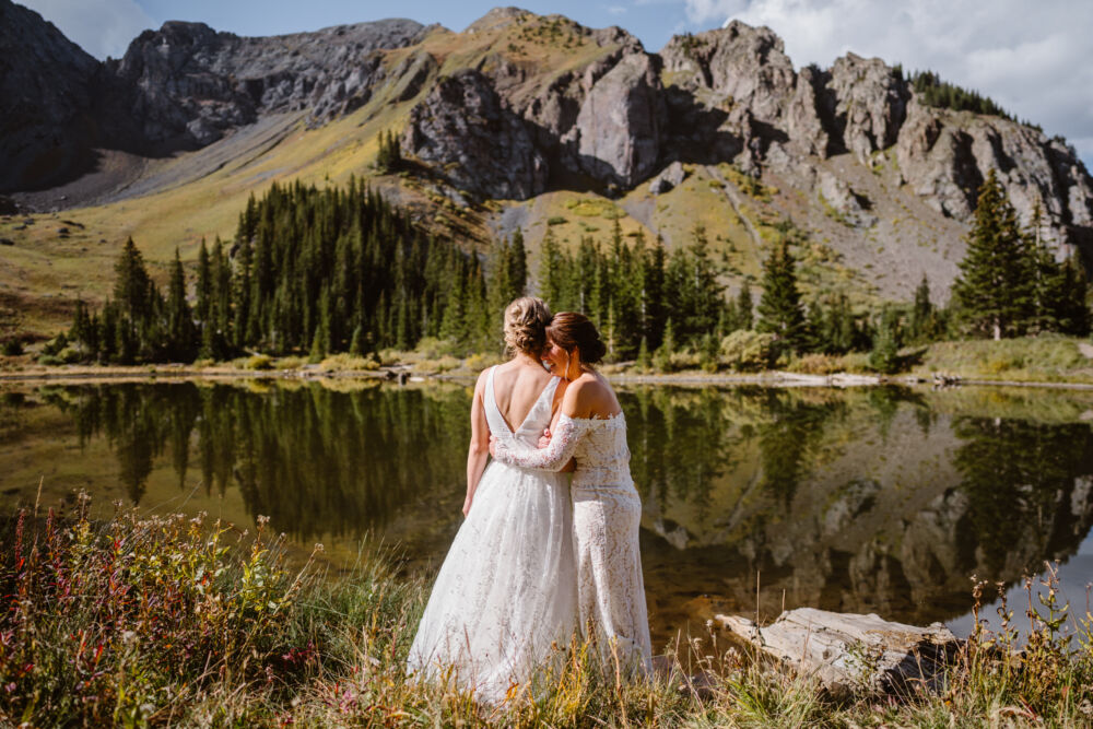 Lake wedding photography example with shoreline and reflection