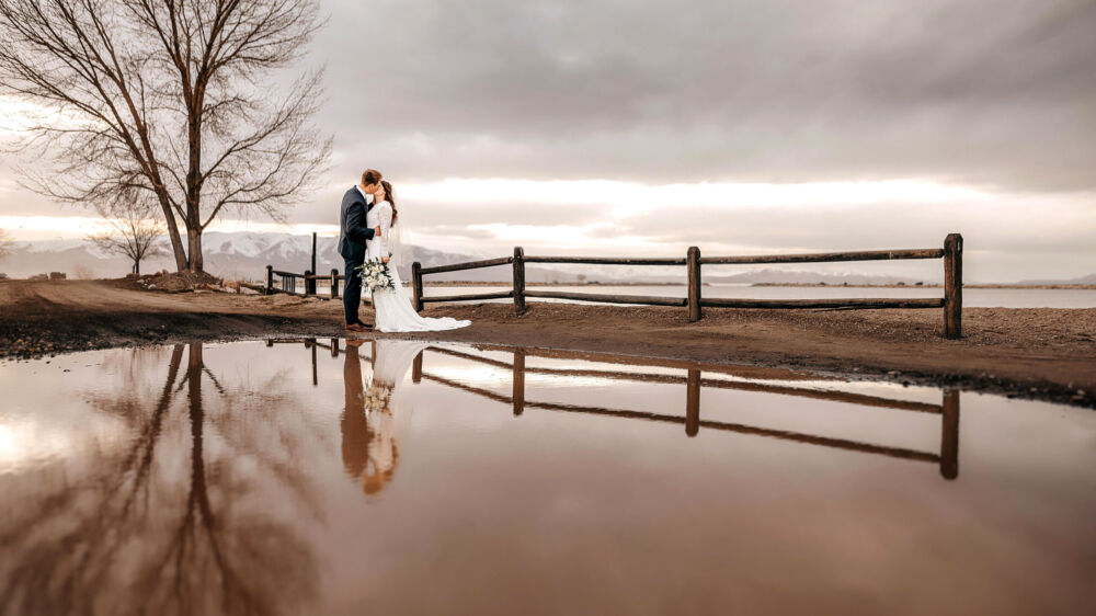 couple in reflection for lake wedding photography