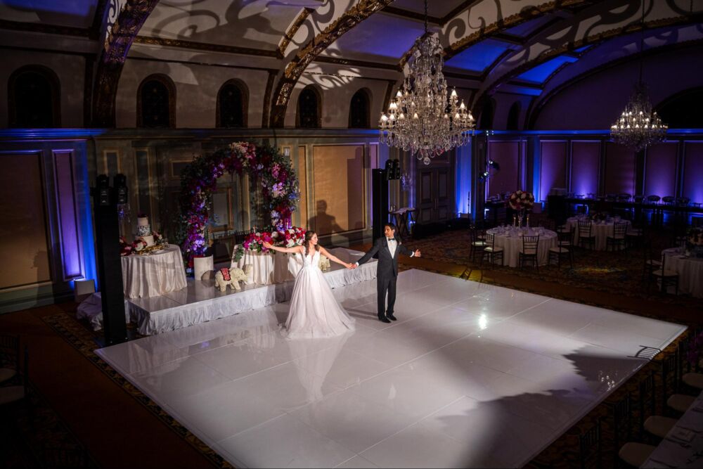 Newlyweds share first dance during reception