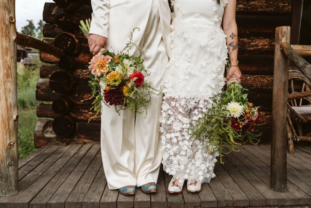 Couple wears interesting textures during one of many rustic boho weddings